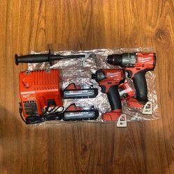Milwaukee M18 Fuel Brushless 1/2” Hammer  Drill/Driver (2904-20) (1) M18 impact driver Fuel surge (2760-20) (2) M18 Redlithium  High Output CP 3.0
