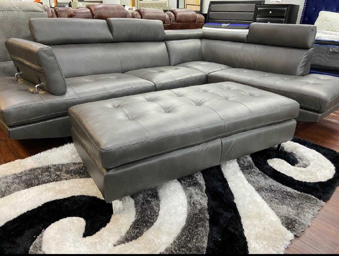 MODERN SOFA WITH ADJUSTABLE HEADRESTS!!!TEXT 30777 TO 22462 FOR $50 DOWN!!!!