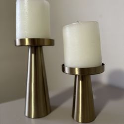 Two Candle Holders With Candles