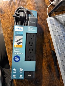 New Philips surge protector has four grounded outlets and two charging ports, one USB-C and one USB-A. This black power strip includes a 4ft braided c