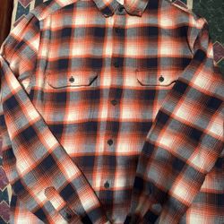 Orange and white plaid button-up flannel shirt #flannel