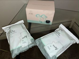Brand New Motif Breast Pump + Milk Storage Bags