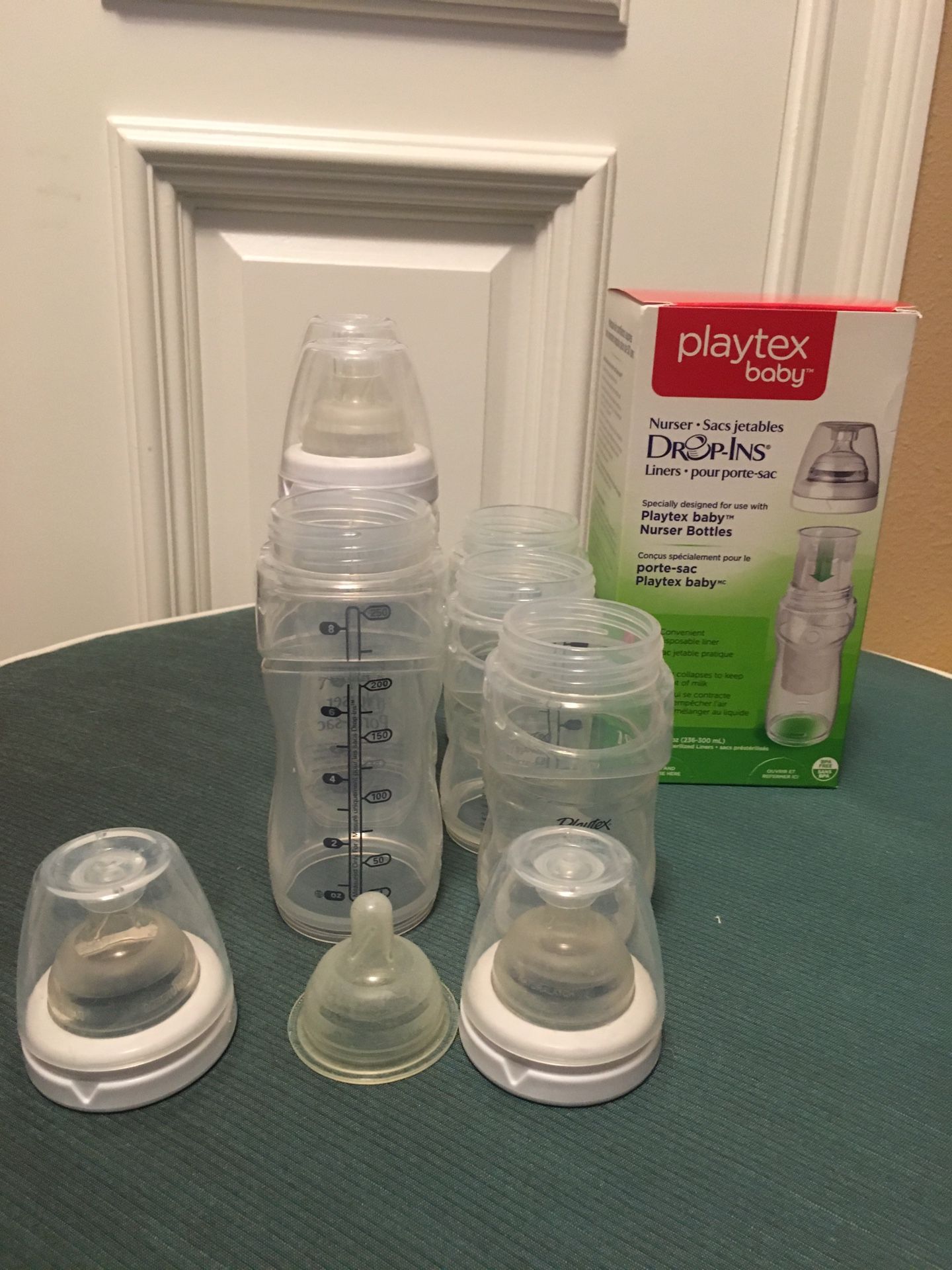 Playtex nurser bottles and 8 oz sleeves