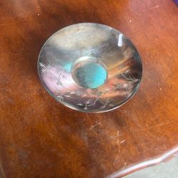 This is a vintage silver-plated mustache cup saucer made by James W. Tufts of Boston. The company was known for its quadruple-plated silver hollowware