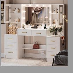 Vanity table with mirror and lights
