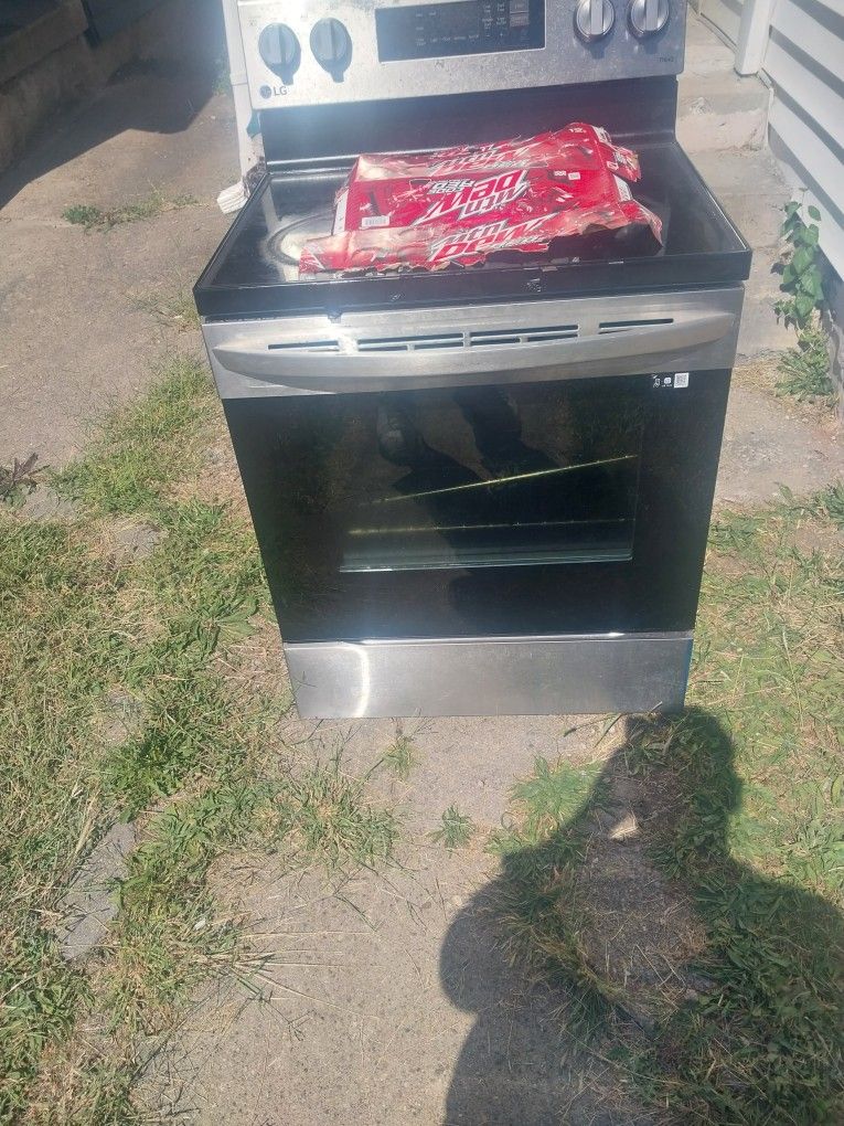 LG Electric Stove.. And A Window Ac