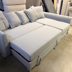 IKEA HOLMSUND sofa bed with storage chaise.