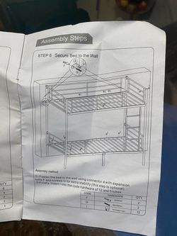 White twin metal bunk bed