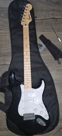 Guitar with amp + accessories
