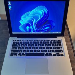 Apple MacBook Pro. 13.3”. 2.3 GHz Core i5. 256 GB SSD. 8 GB Ram. Windows 11 Pro.