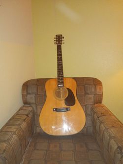 Sigma martin d 10 Anniversary model 1981 . Has ebony bridge ,  saddle & pin's  abalone Cap's