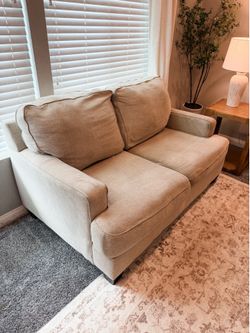 Beige couch loveseat