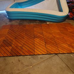 8 Boxes of wooden tiles that snap together