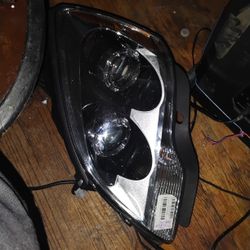 Headlight  GmcAcadia 2016