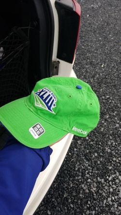 Super Bowl hats the green one is the Arizona Cardinals 2009 Tampa Bay brand new.