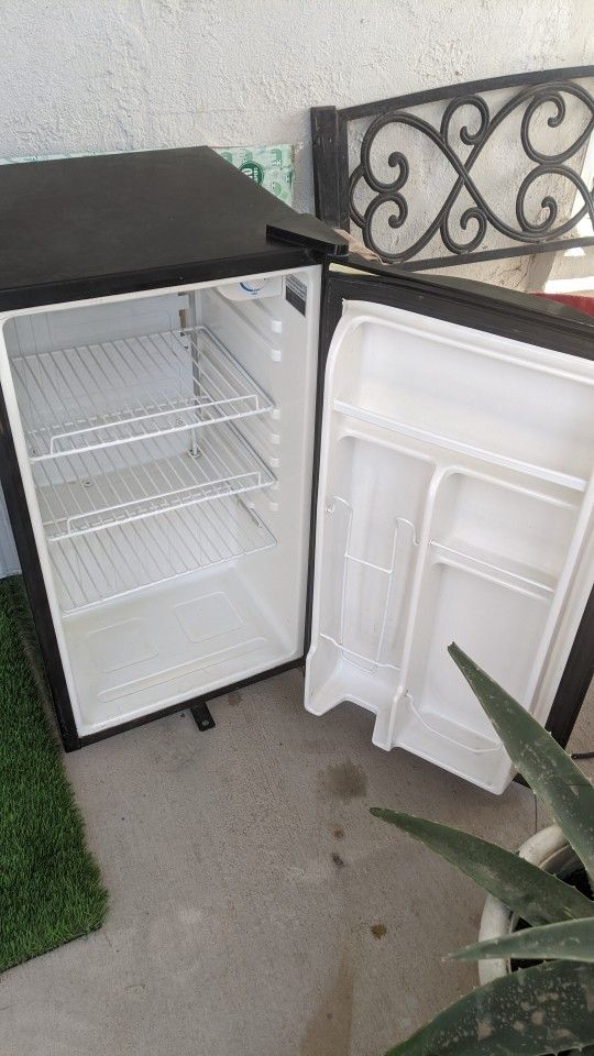 General Electric Mini Fridge 30" By 17" $55 Firm