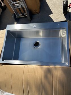 Undermount 32-in x 19-in Stainless steel kitchen sink with attachment for $140