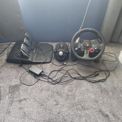 logitech g29, steering wheel, shifter, and pedals