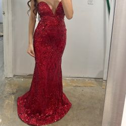 Stunning red strapless dress, is brand new and comes with all tags on.  Perfect for any special occasion/prom.
