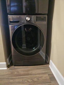 LG black front loading washer & dryer stackable