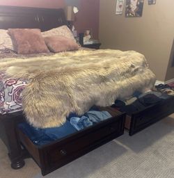 King size bedroom, set with dresser, chest, and and tables