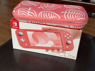 Nintendo Switch pink in original box like new with case