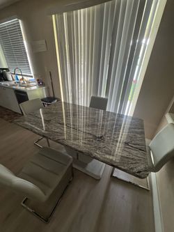 Table and chairs for sell in great condition best price