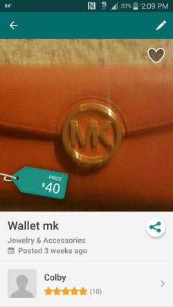 This is and orange mk wallet