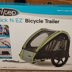 NEW IN BOX - INSTEP BICYCLE TRAILER FOR SALE $125 O.B.O.