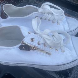 White.  Women’s Canvas Sneakers Size 10