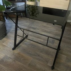 Black desk w glass top 