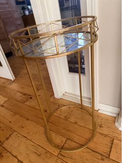 Gold pedestal table - home decor