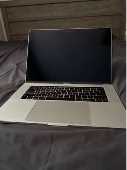 Apple MacBook Pro 15.4” Silver Colorway