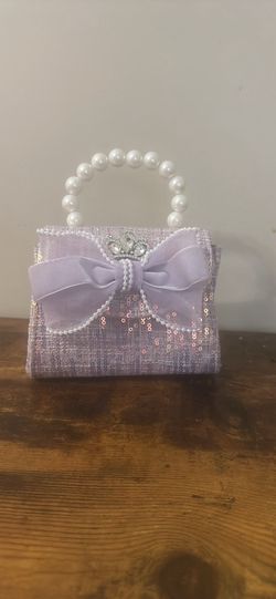 Purple Bow design with pearl design purse