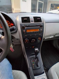 2009 Toyota corolla  le. Gray. Sedan   clean  title. In. Hand