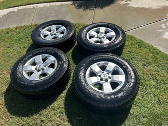 4 tires and rims For Nissan Frontier