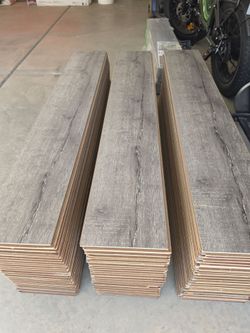 250ft² of Beautiful Gray Laminate Floors