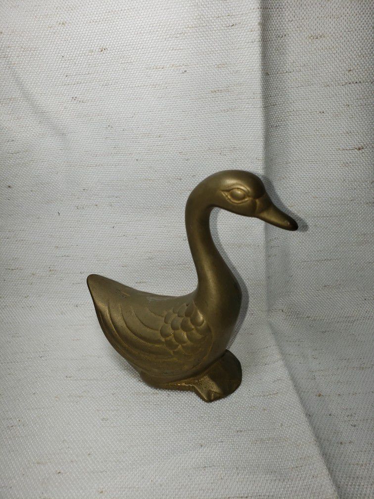 Brass duck figurine 4 1/2" T X 4 3/4" 