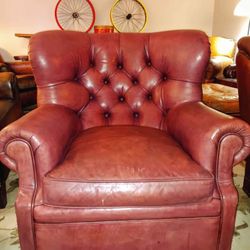 A Pair Of Limited Edition wing-backed Writer's Leather chairs with a matching ottoman by Ralph Lauren