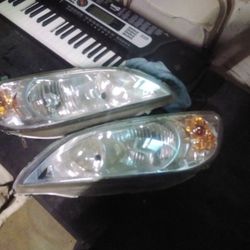 Headlights   2005 Honda Civic   &2002-2006 Lincoln Navigator 