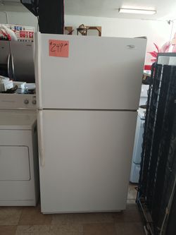 Whirlpool Refrigerator white ex large excellent . Warranty . Delivery available . 2203 Fowler st. Ft. Myers 33901