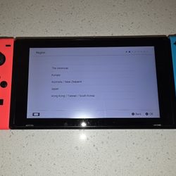 Nintendo Switch W/ Neon Red And Blue Controller
