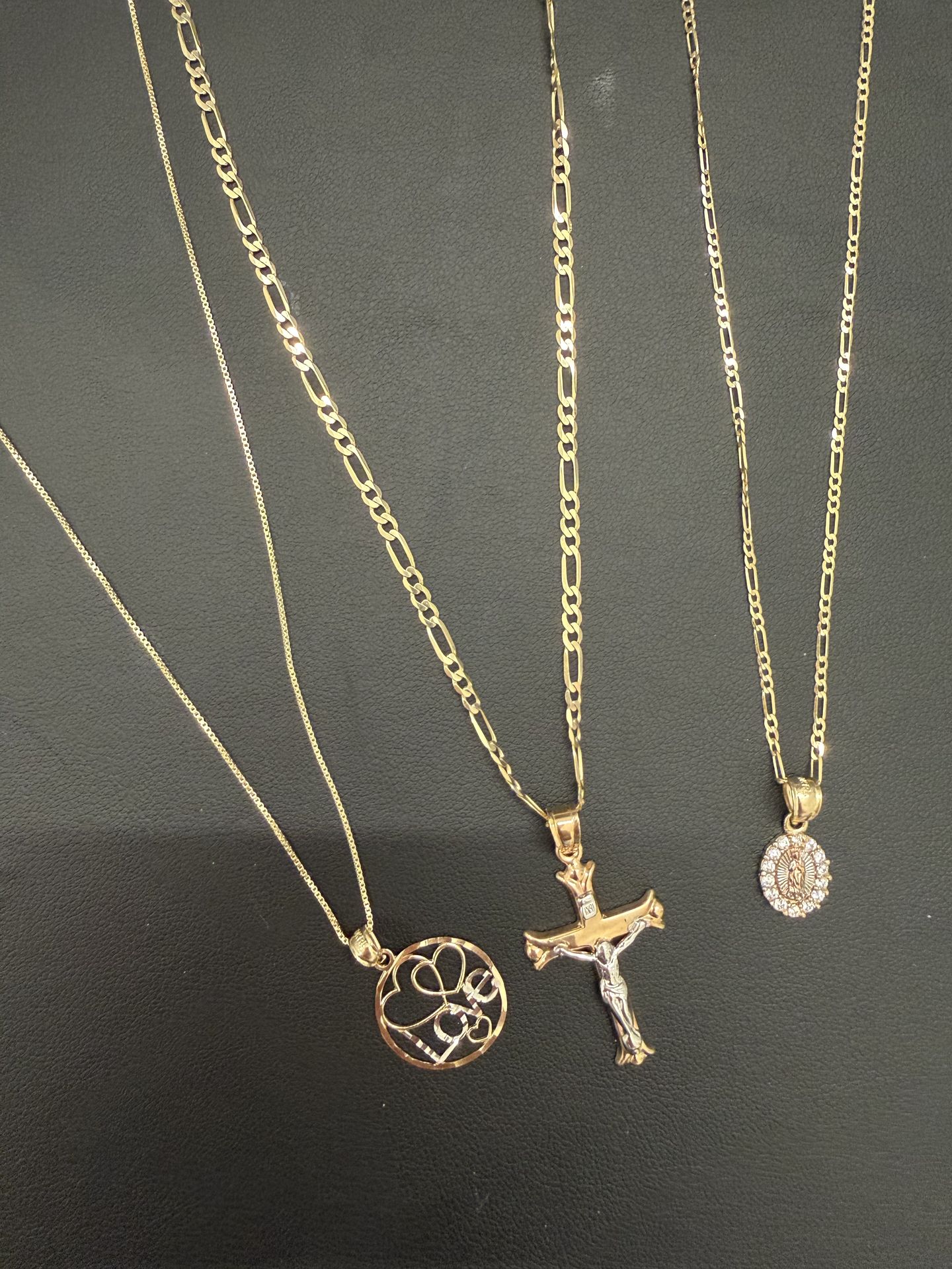 Brand new 14k chains on 10k pendants