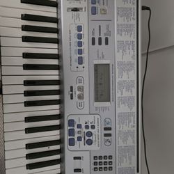 Casio CTK 595 Keyboard And Stand.  