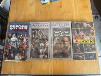 Lot Of 4 collection of vintage World Wrestling Federation (WWF) VHS tapes from the Attitude Era.