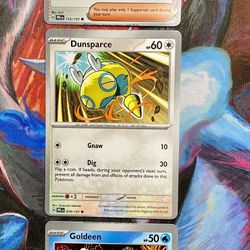 Pokémon Prismatic Evolution Miscut Error Card Lot- Larry’s Skill, Dunsparce, Goldeen!