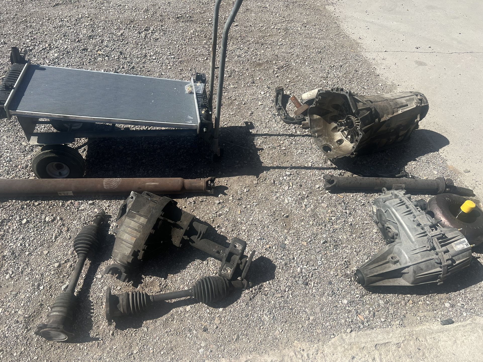 08 Escalade,Cadillac ,transfer Case ,front Differential,left And Right Axels Front,radiater Almost New ,also 150 K Transmission Needs Rebuild