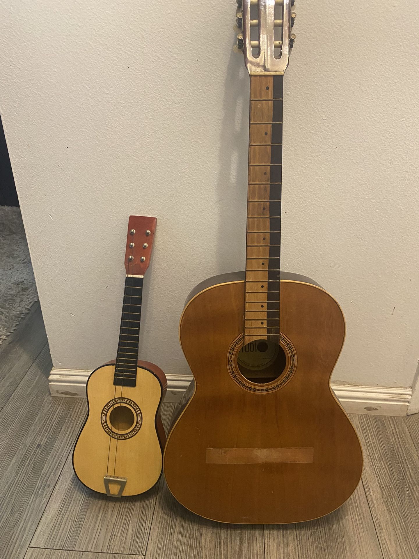 regular and small guitars
