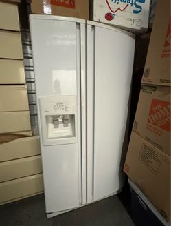 25 cubic foot side-by-side refrigerator in white, featuring an in-door water and ice dispenser.