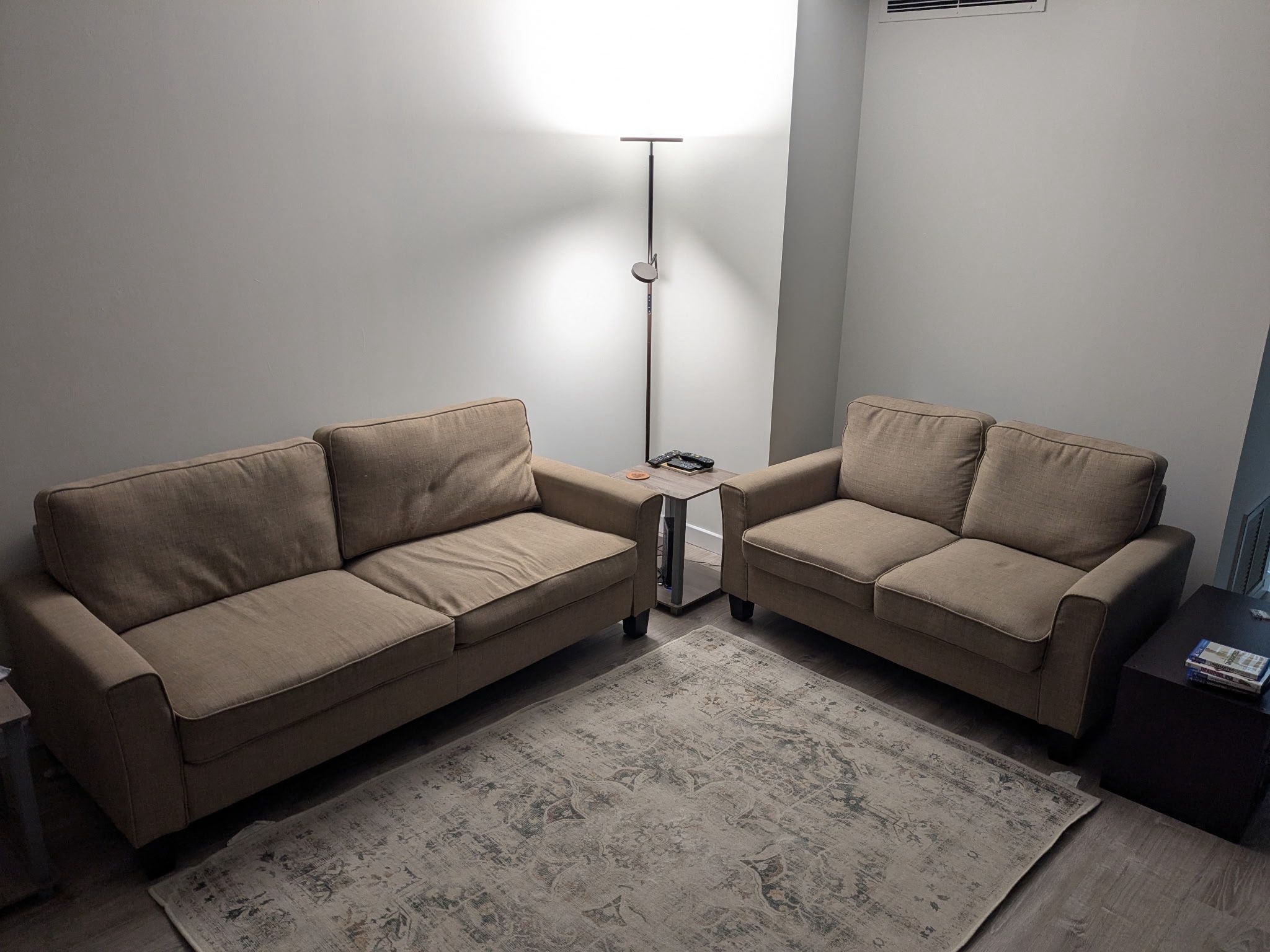 Tan couch and loveseat set